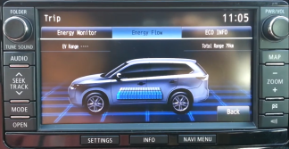 Mitsubishi MMCS J-11 head unit displaying the Outlander PHEV energy-flow screen in English.