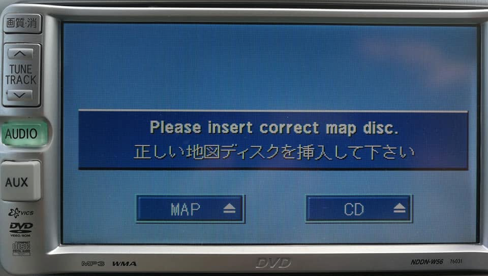 Toyota NDDN-W56 displaying "Please insert correct map disc."