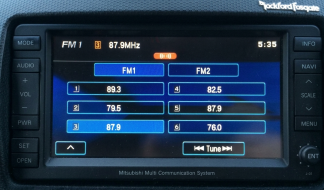 Mitsubishi MMCS J-01 head unit displaying its FM audio menu