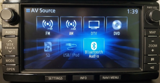 Mitsubishi MMCS J-12 head unit showing the Settings menu in English